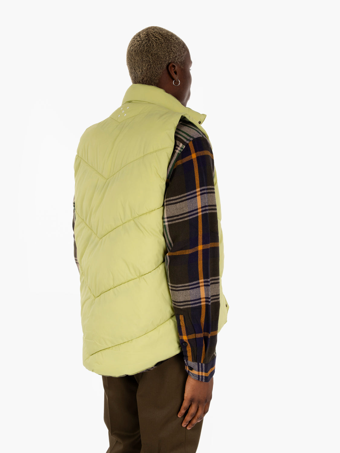 Green double-face padded vest