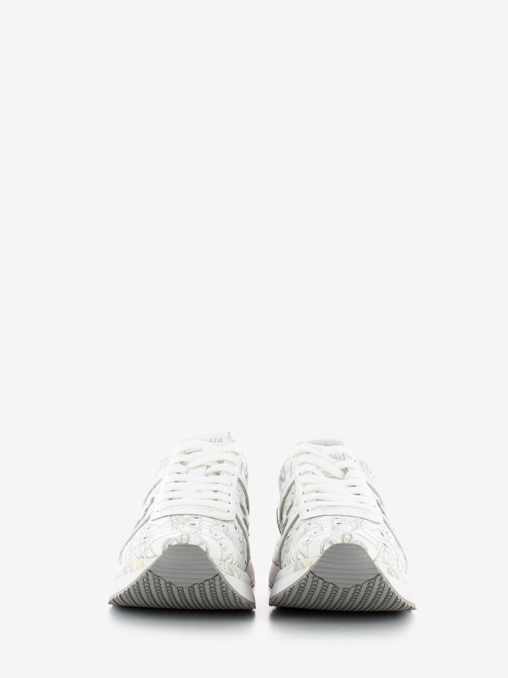 Conny white sneakers