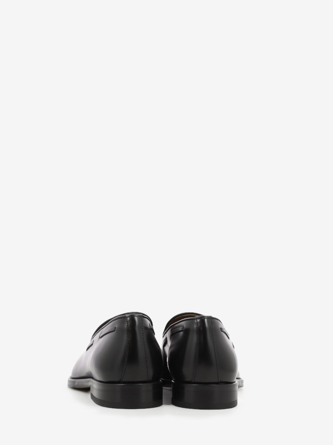 Black tassel loafers