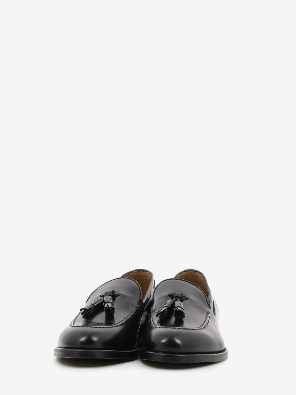 Black tassel loafers