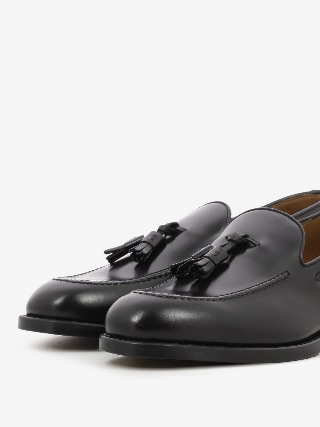 Black tassel loafers