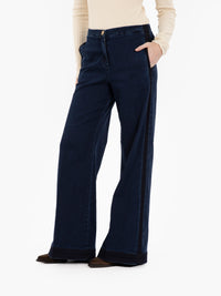 Flaire smocking denim jeans over used blue