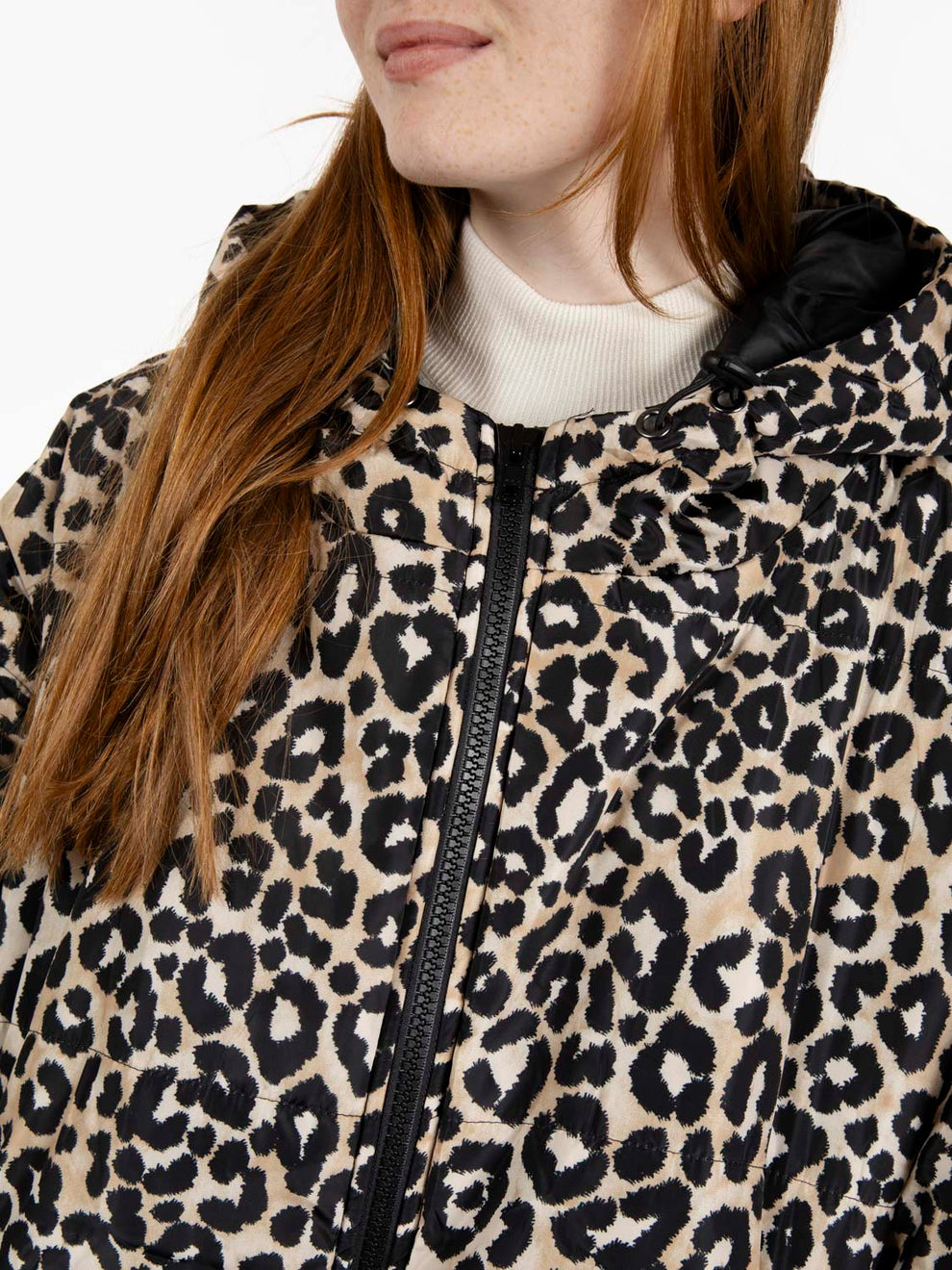 Piumino lungo con cappuccio snow leopard