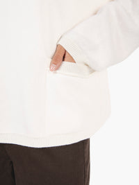 Maglione con tasche panna / confetto