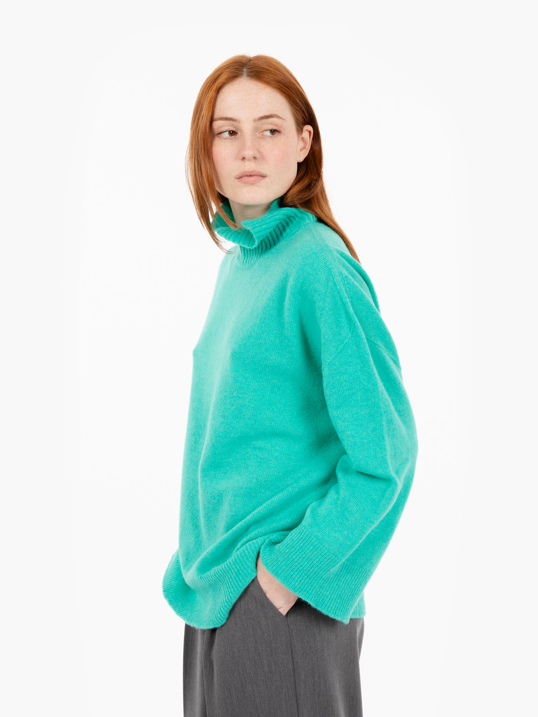 Green turtleneck wool sweater