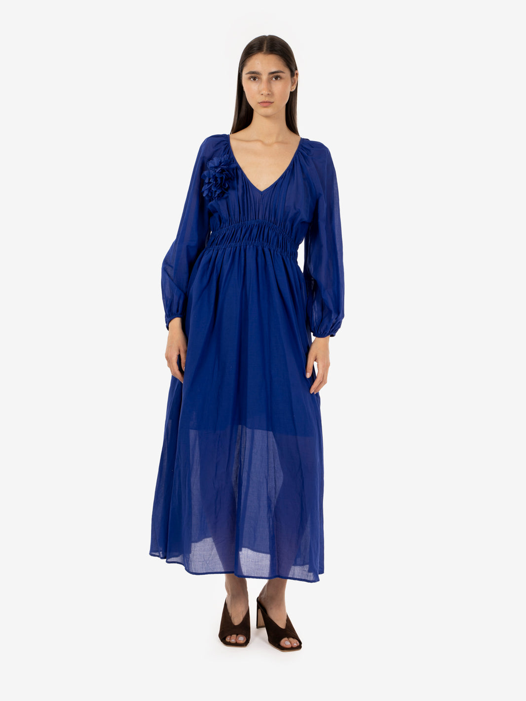 Long dress with electric blue brooch