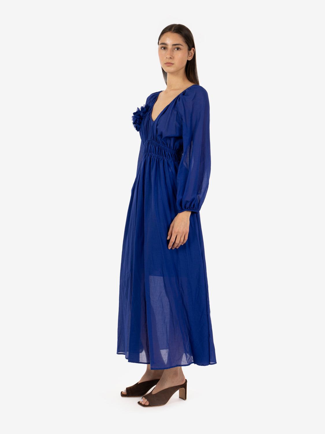 Long dress with electric blue brooch
