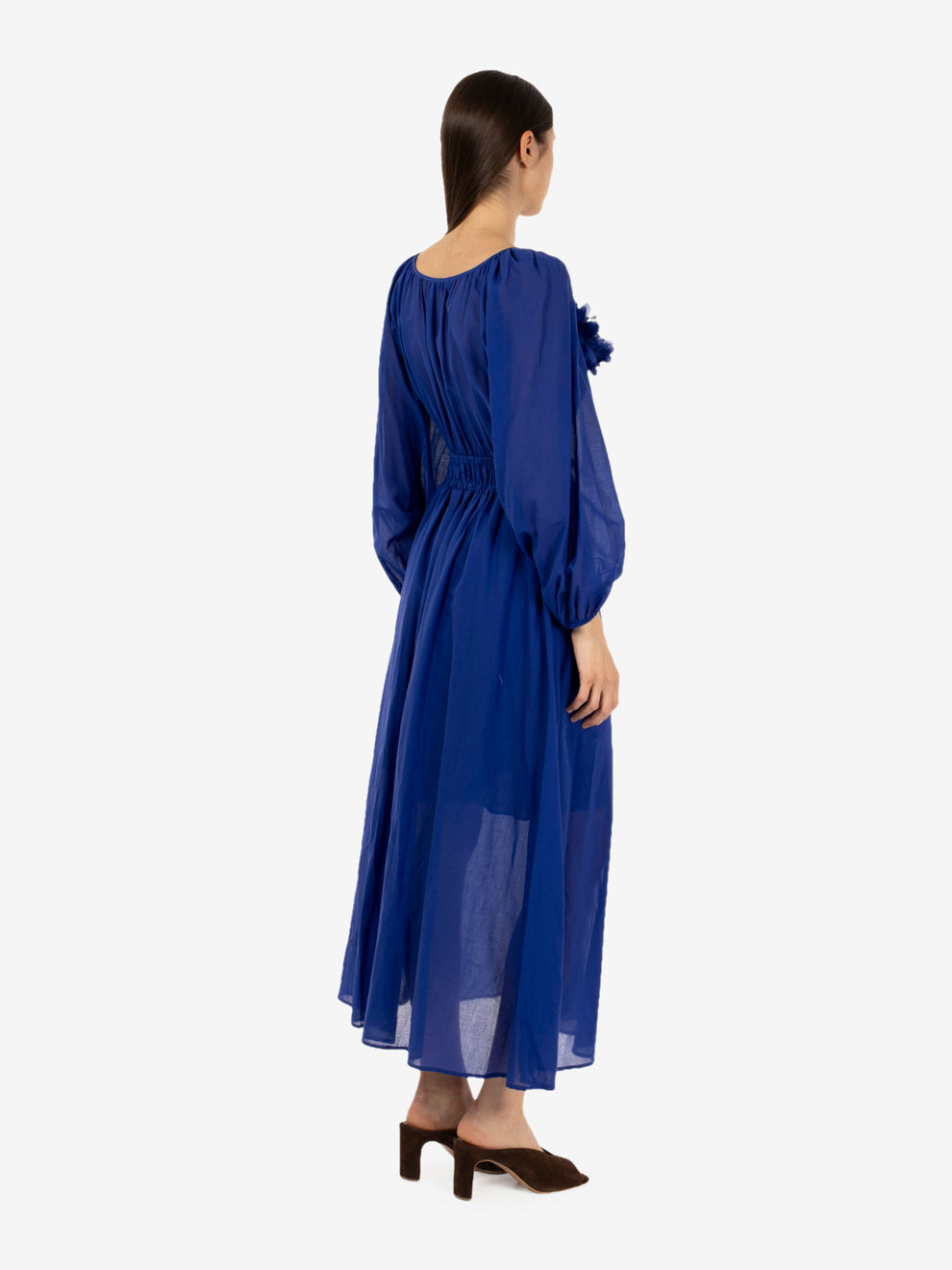 Long dress with electric blue brooch