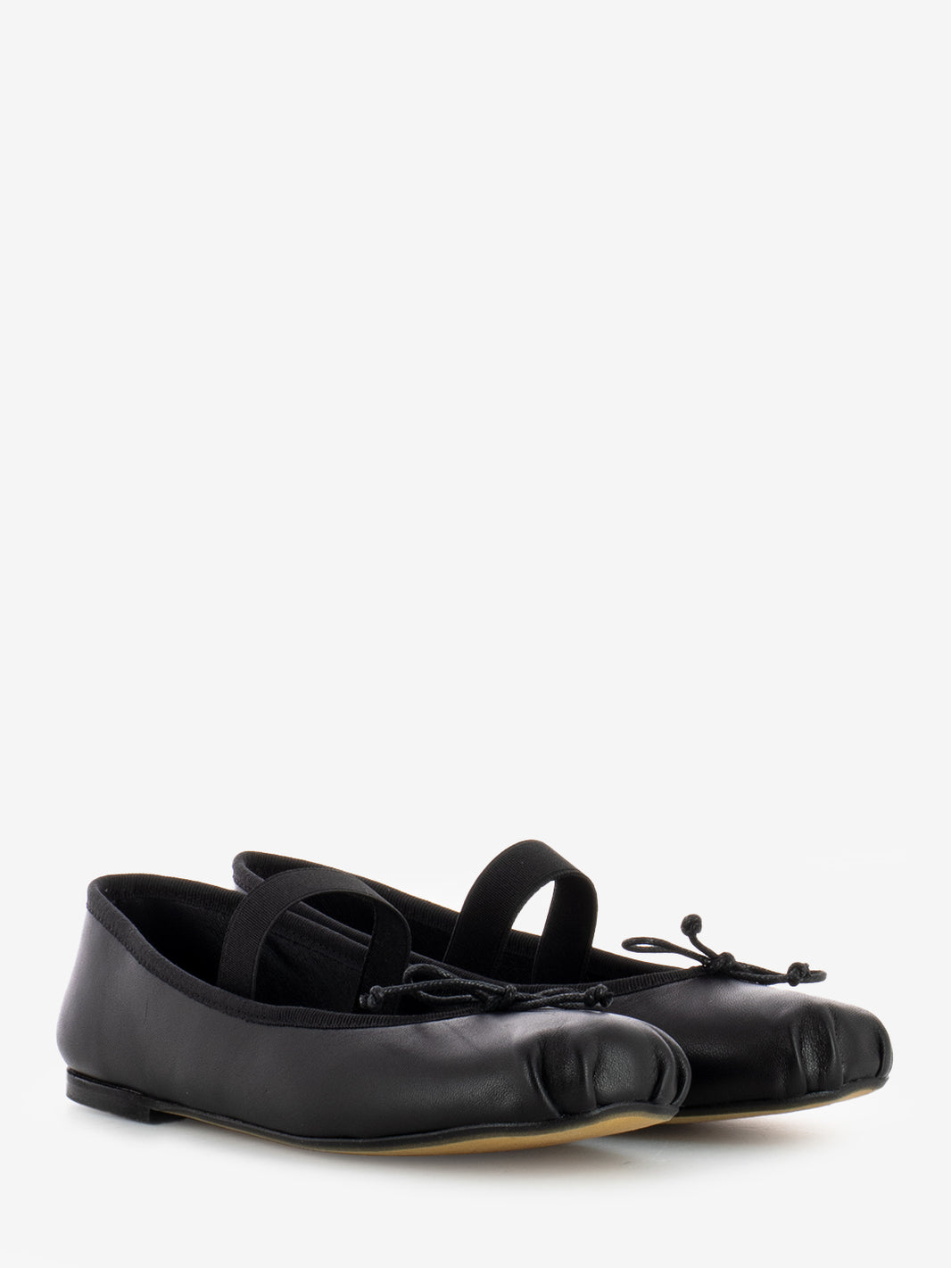 Ballerina with black elastic tassel