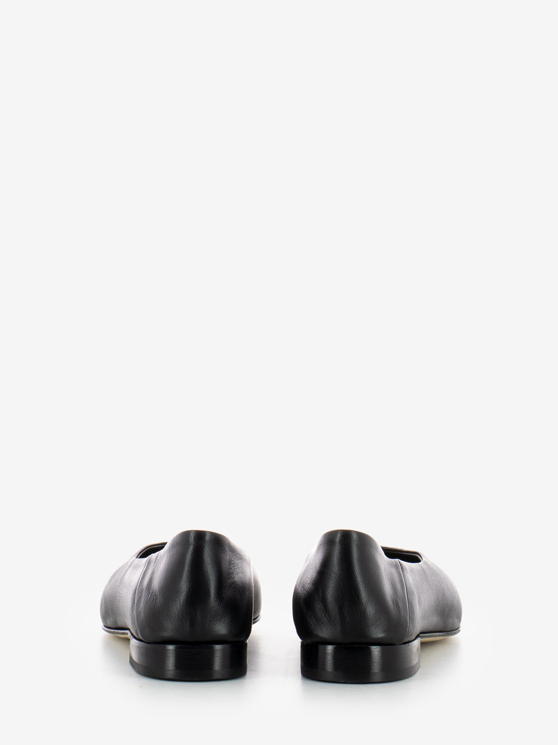 Black leather pointed toe ballerinas
