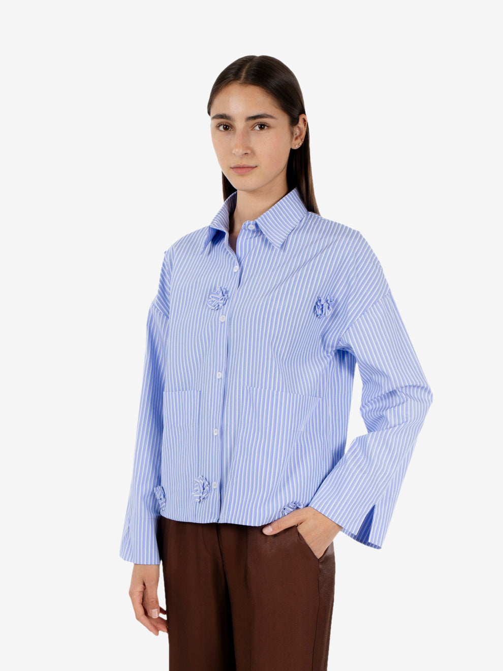 Striped shirt with applied blue flowers
