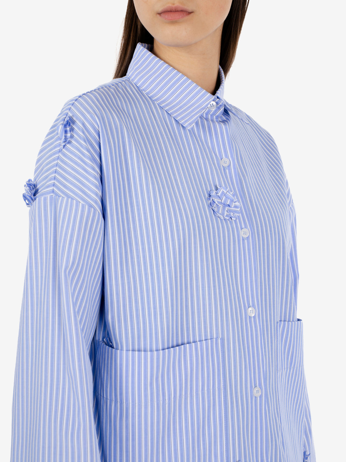 Striped shirt with applied blue flowers