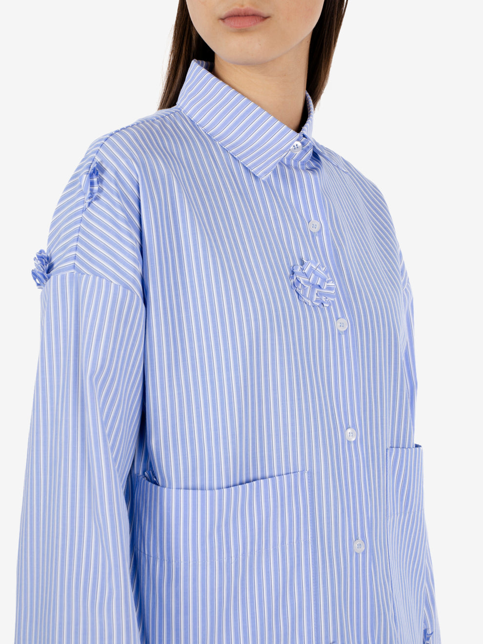 Striped shirt with applied blue flowers