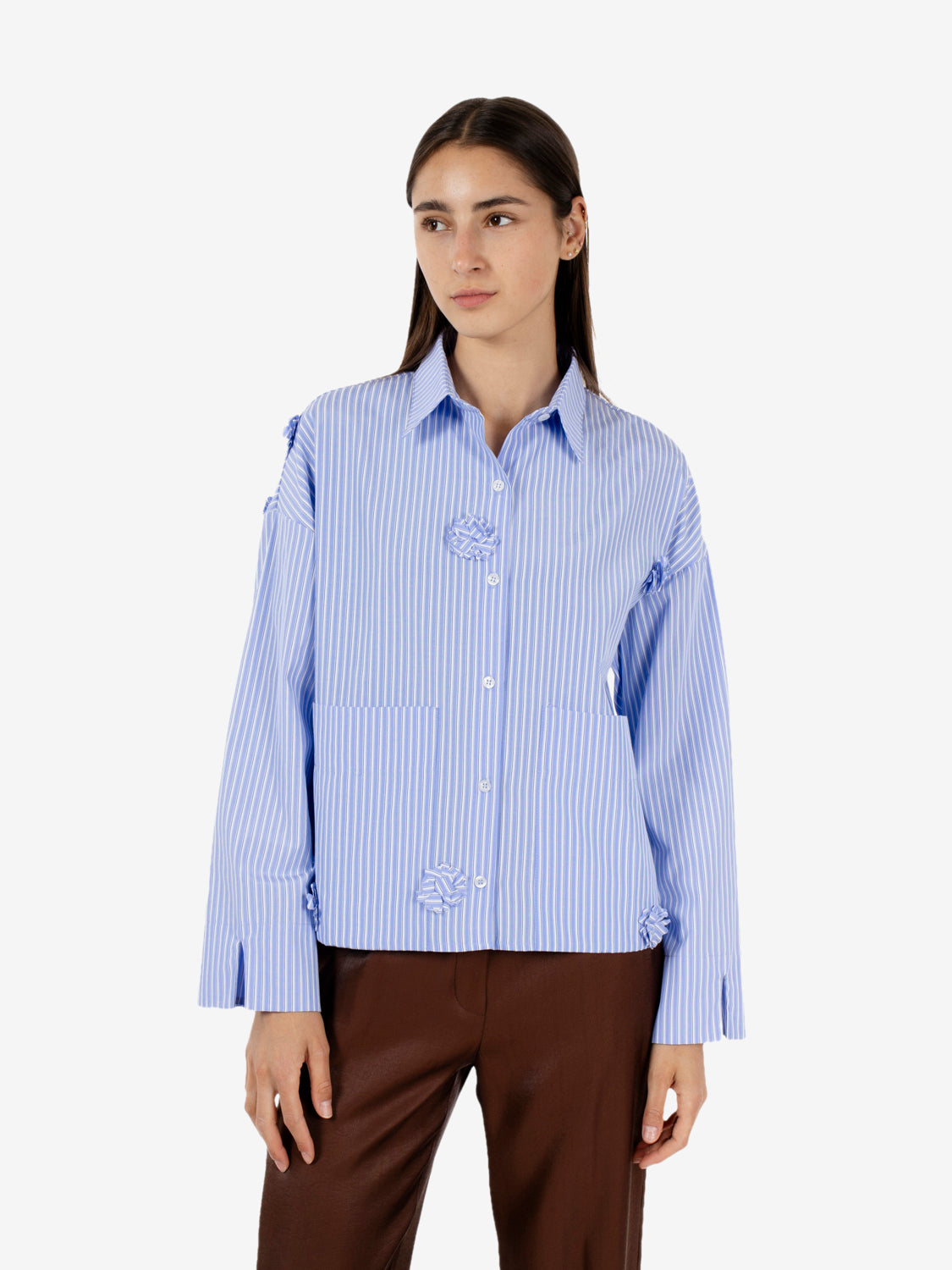 Striped shirt with applied blue flowers