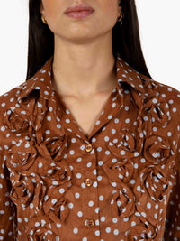 Dark brown polka dot patterned shirt
