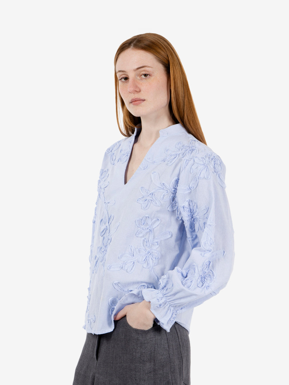 Patterned light blue striped shirt