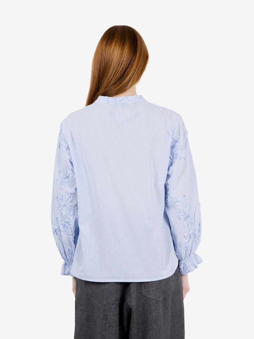 Patterned light blue striped shirt