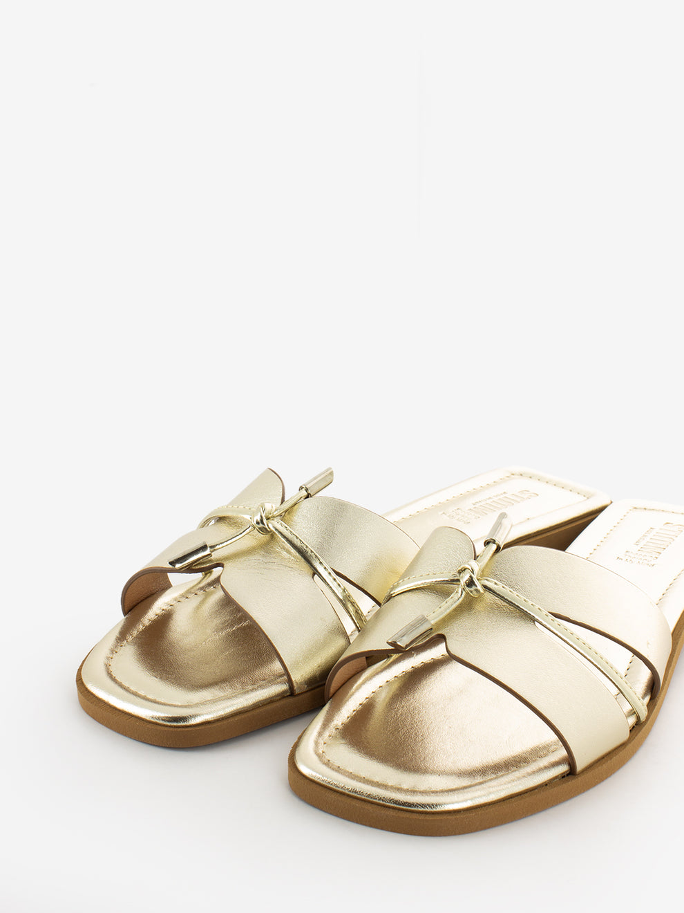 Platinum laminated leather slipper