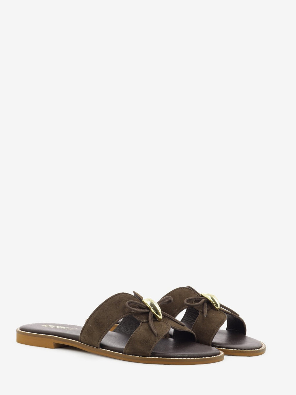 Suede slipper with Moor's head embellishment