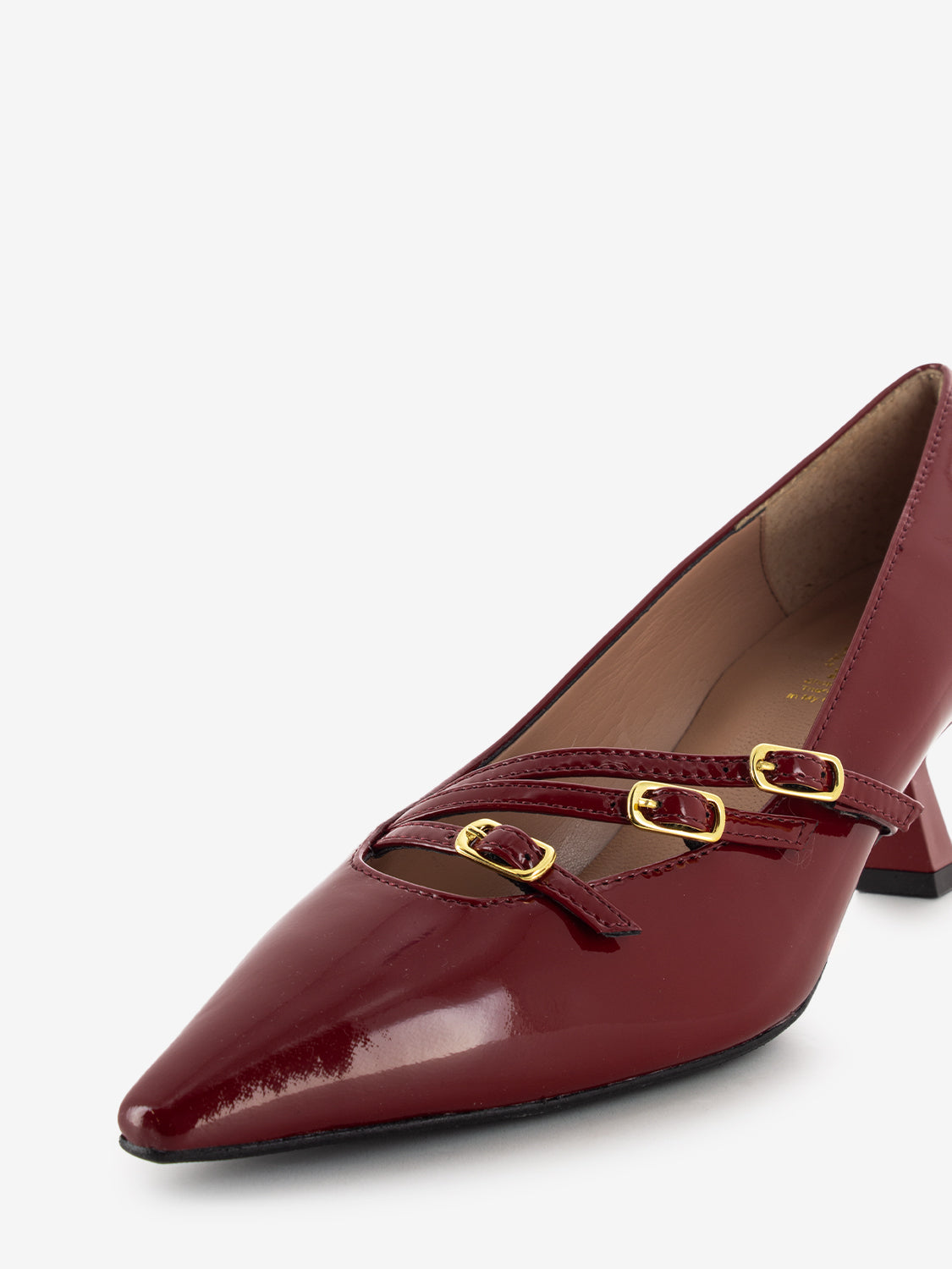 Low red patent leather pumps