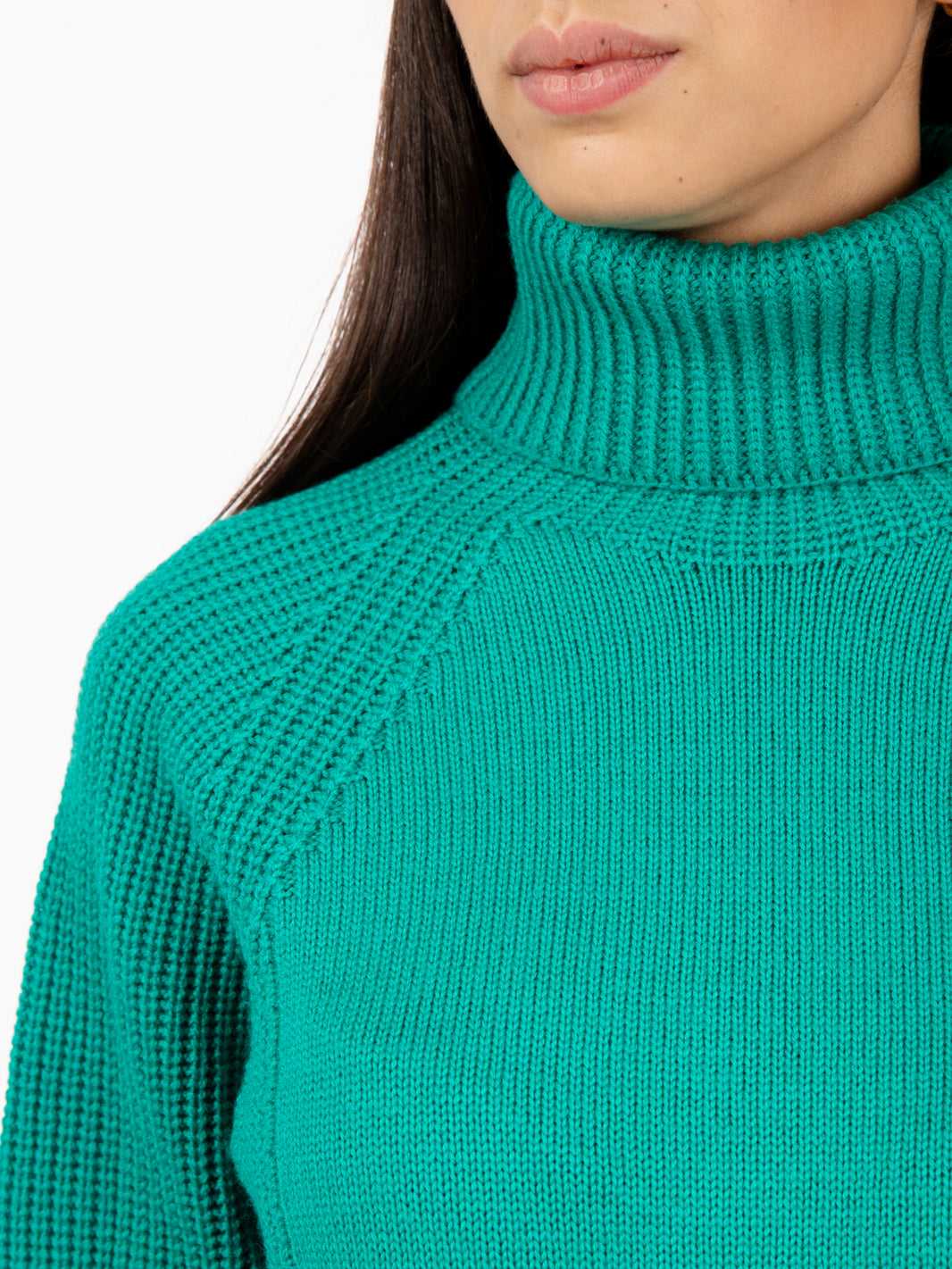 Green wool turtleneck sweater
