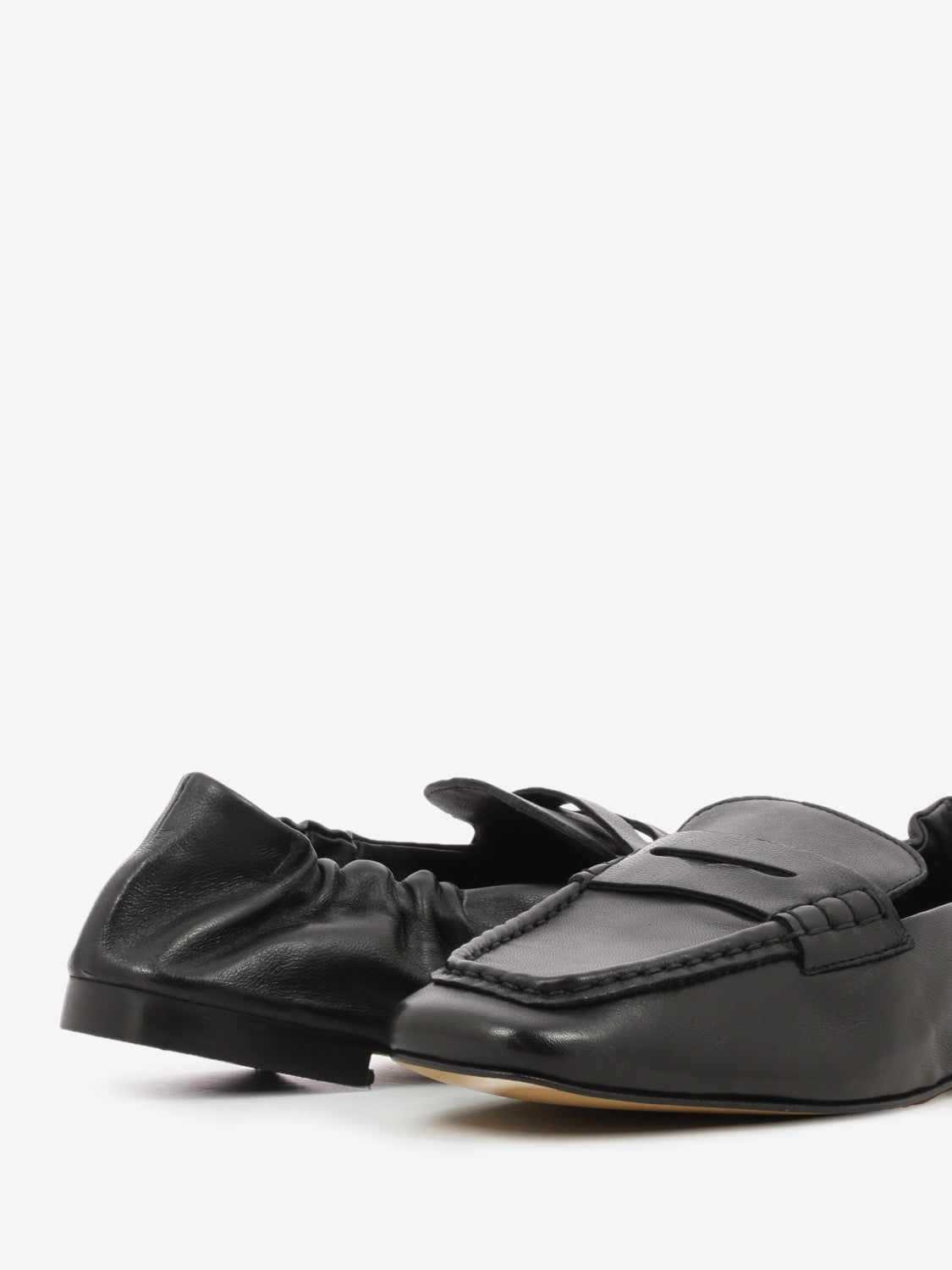Mocassini con elastico in pelle nera