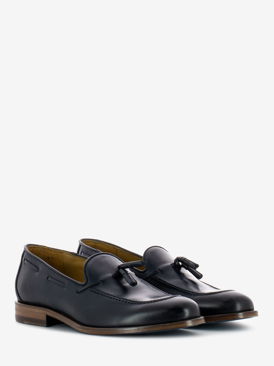 Leather moccasins with blue tassel