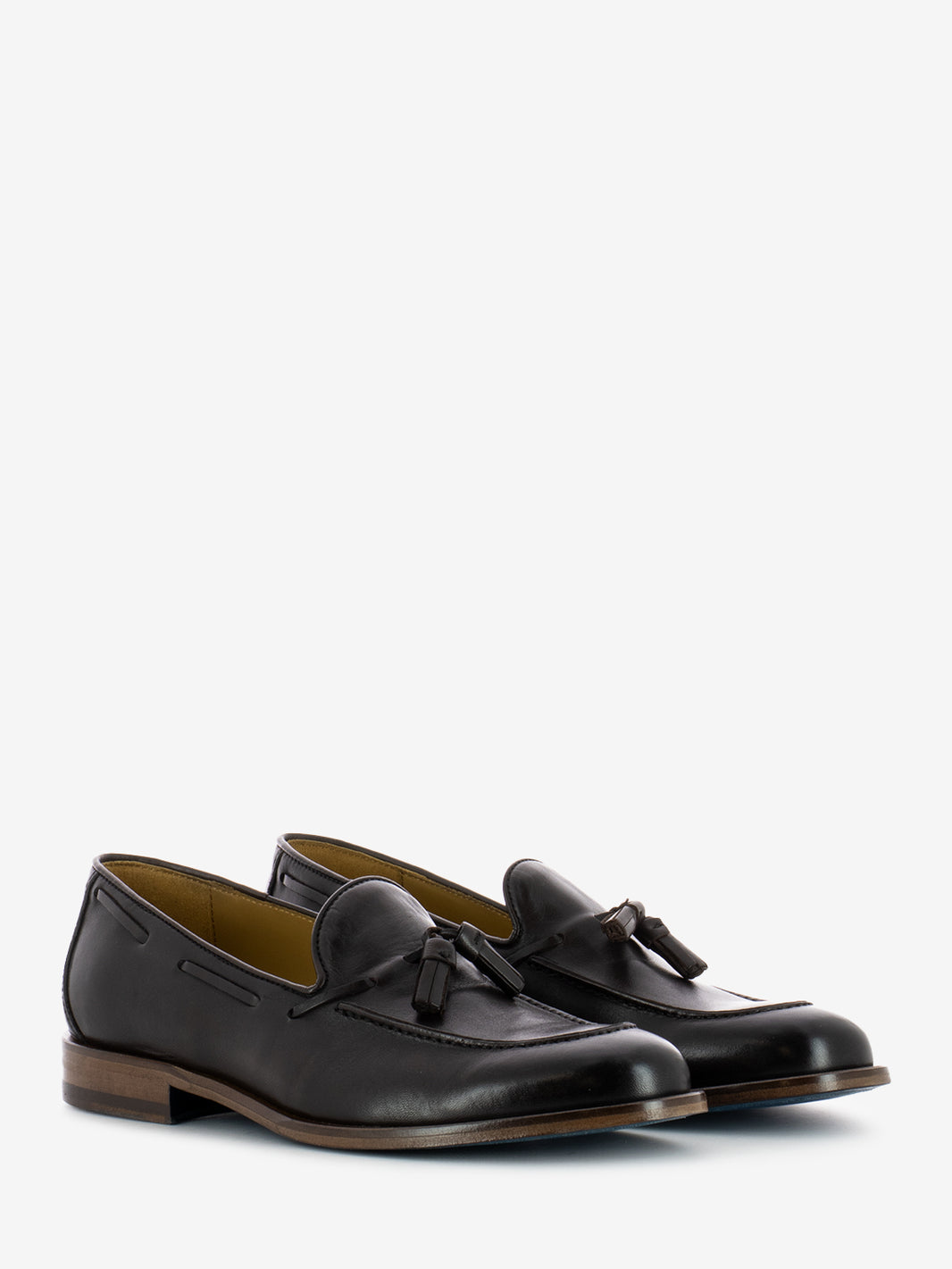 Leather moccasins with dark brown tassel