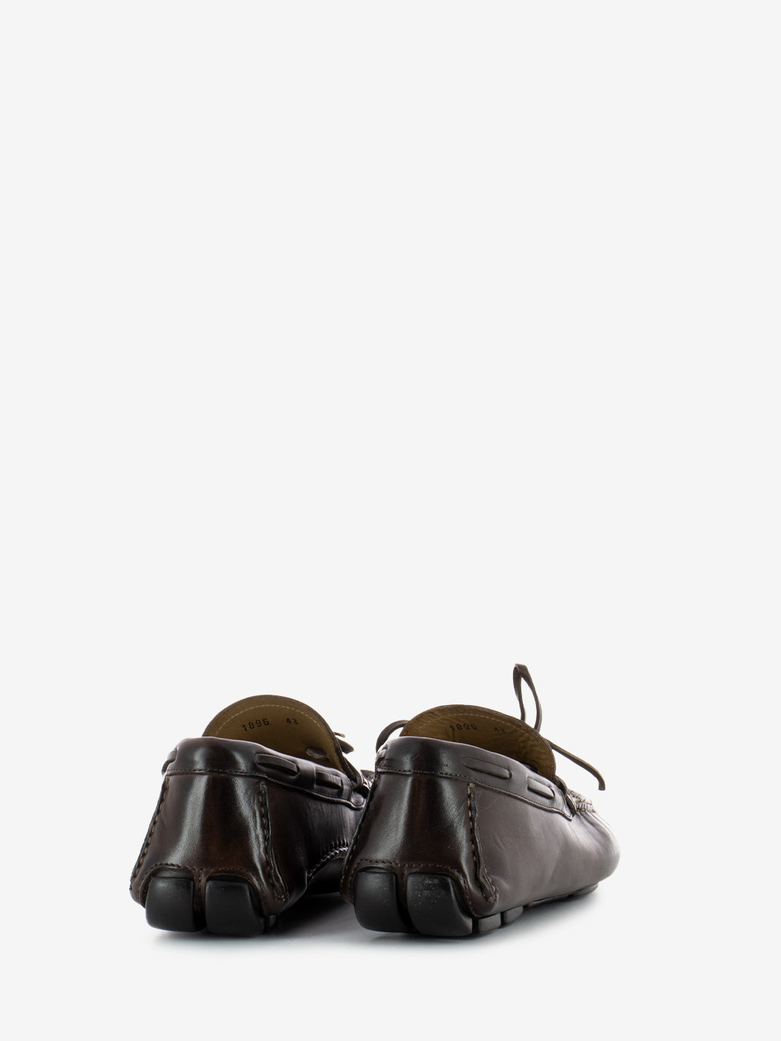 Moccasin with bow in dark brown leather
