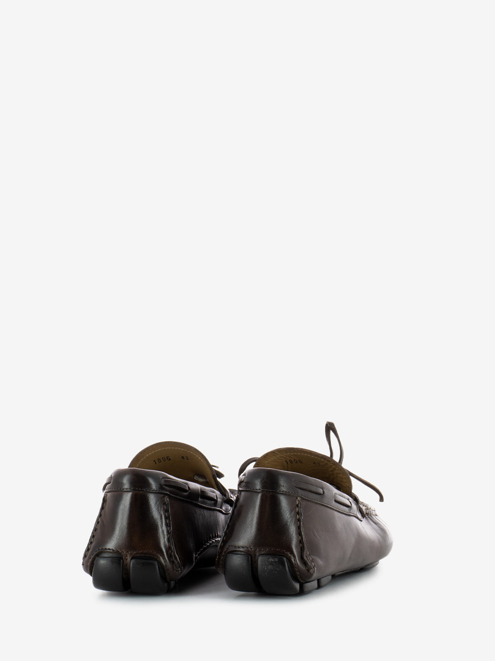 Moccasin with bow in dark brown leather