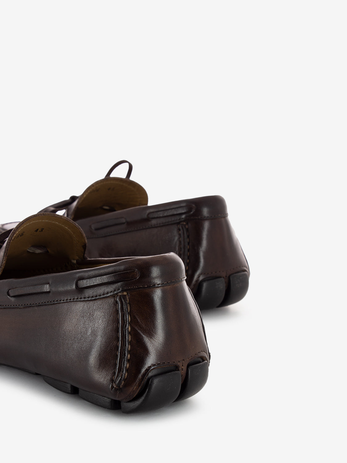 Moccasin with bow in dark brown leather