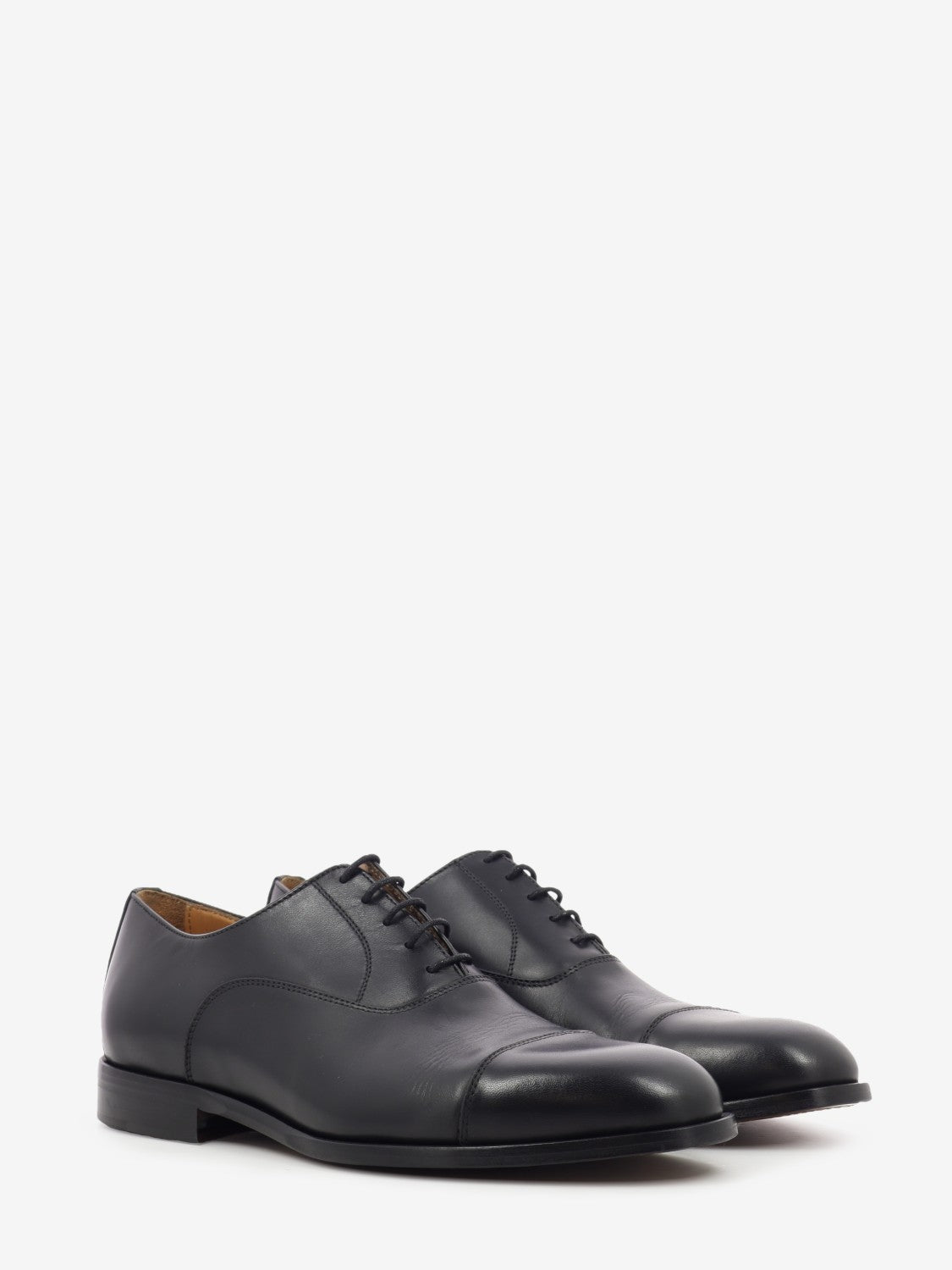 Black leather Oxfords