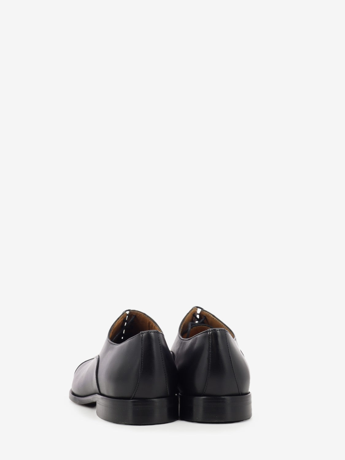 Black leather Oxfords
