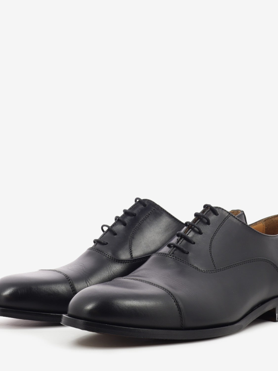 Black leather Oxfords