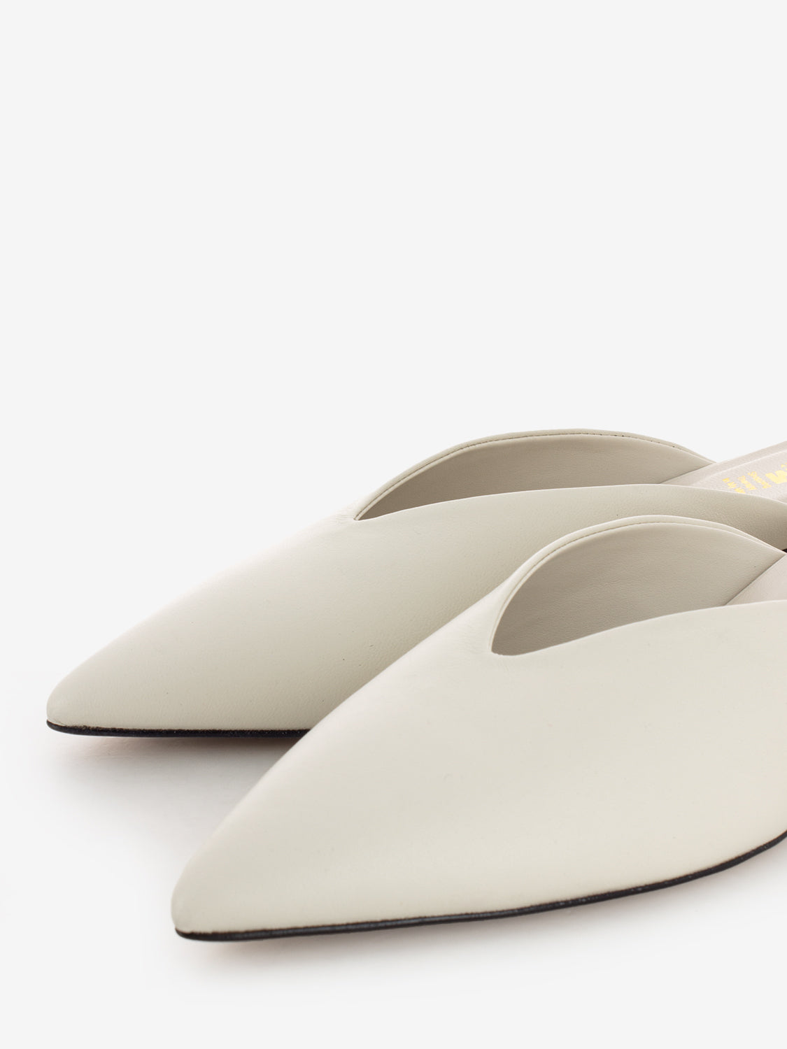 Pointed toe clog with white heel