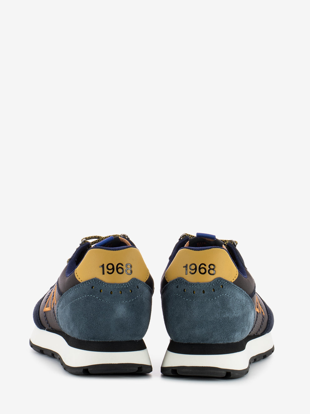 Tom Goes Camping brown sneakers