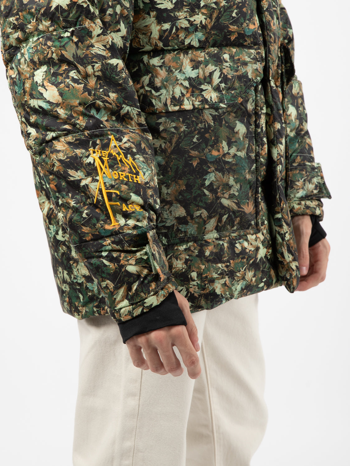 M 73 jacket with all-over green leaf print