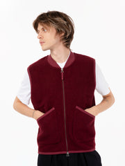 UNIVERSAL WORKS - Zip waistcoat in lovat wool fleece deep red