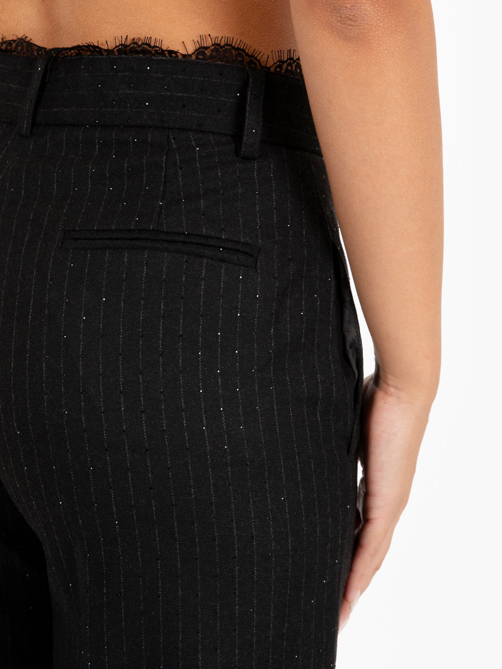 Pantaloni con strass motivo gessato neri