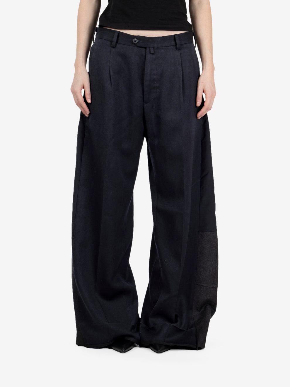 Black pleated trousers