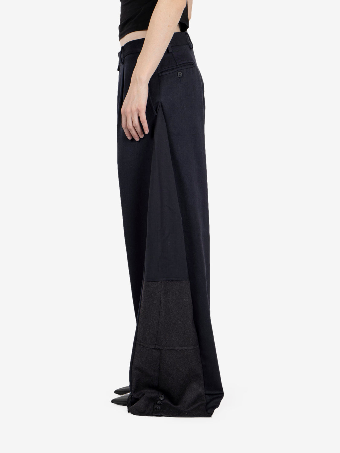 Black pleated trousers