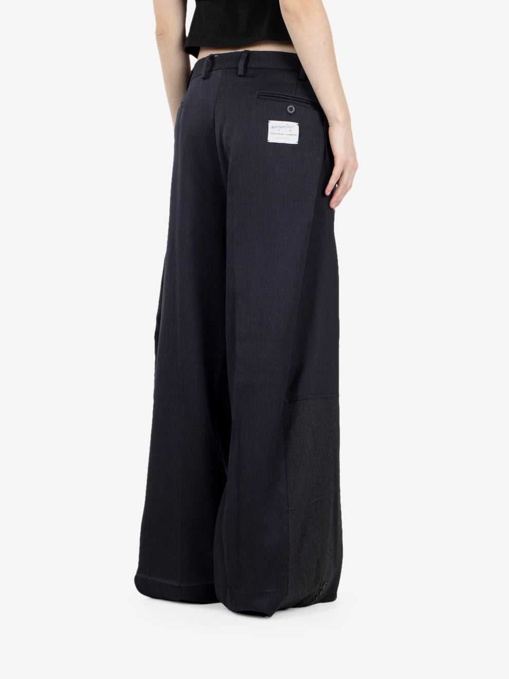 Black pleated trousers