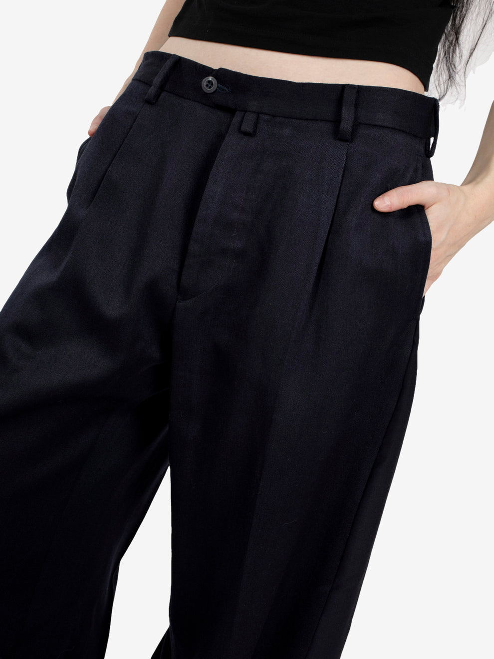 Black pleated trousers