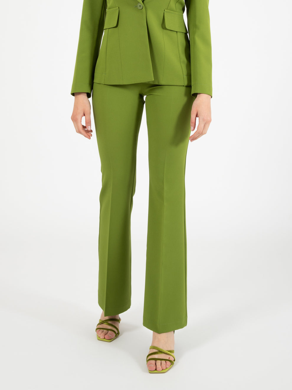 Green flared trousers
