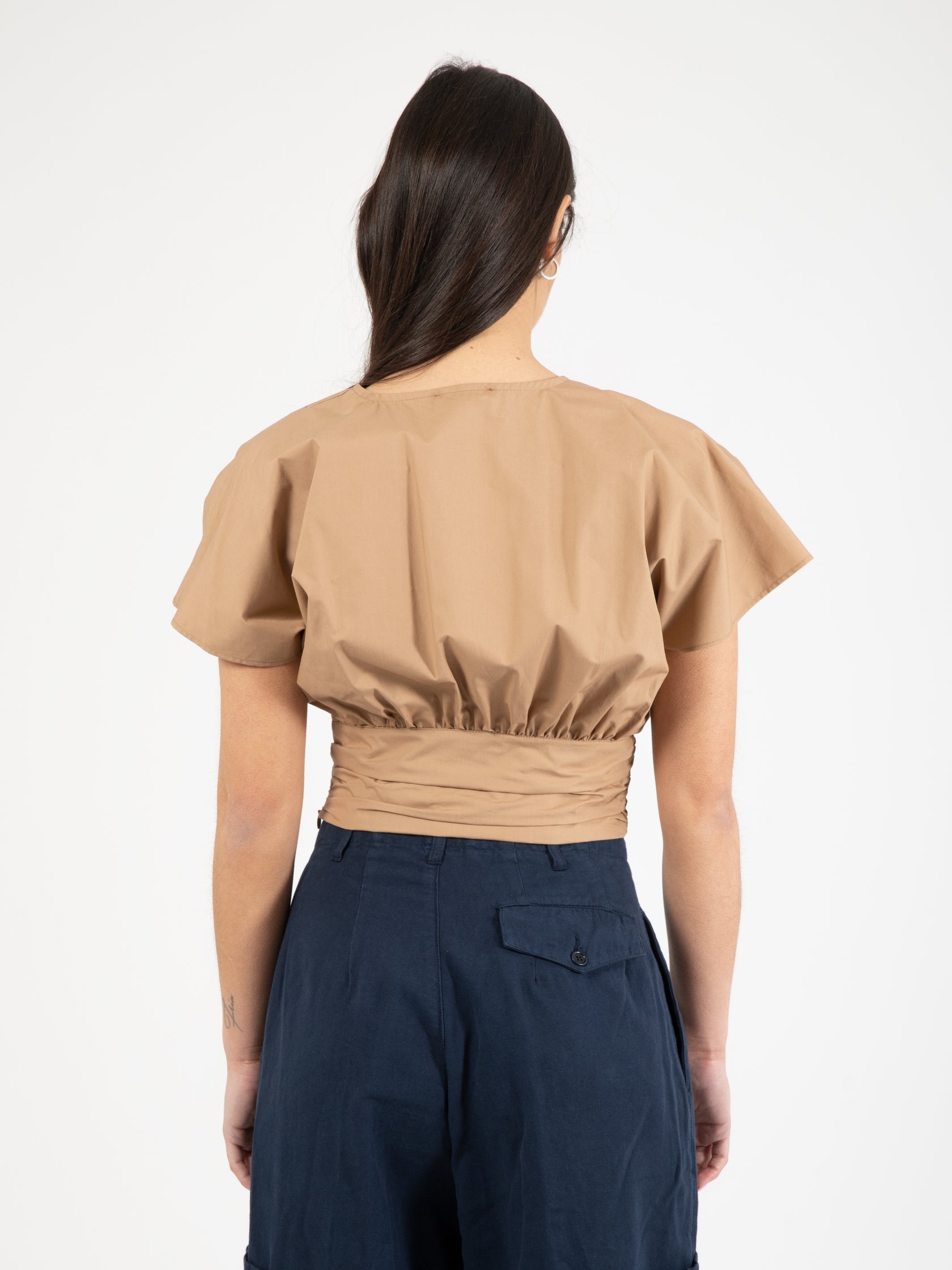 Blusa cropped pipistrello beige