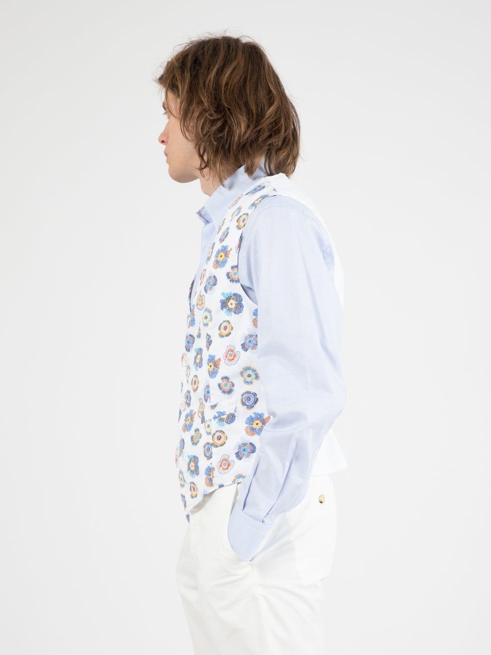 White/blue floral patterned vest