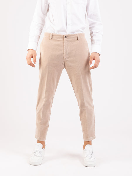 Pantaloni in velluto a coste crema