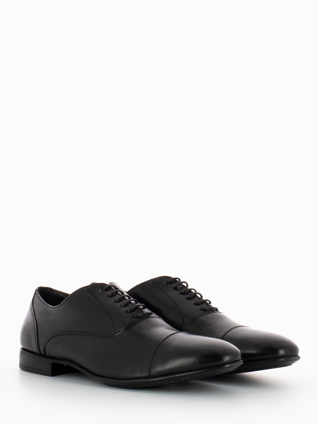 Black Oxfords in soft leather