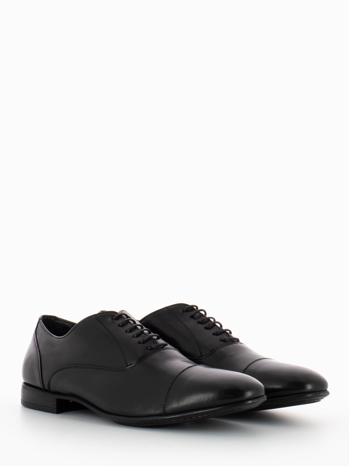 Black Oxfords in soft leather