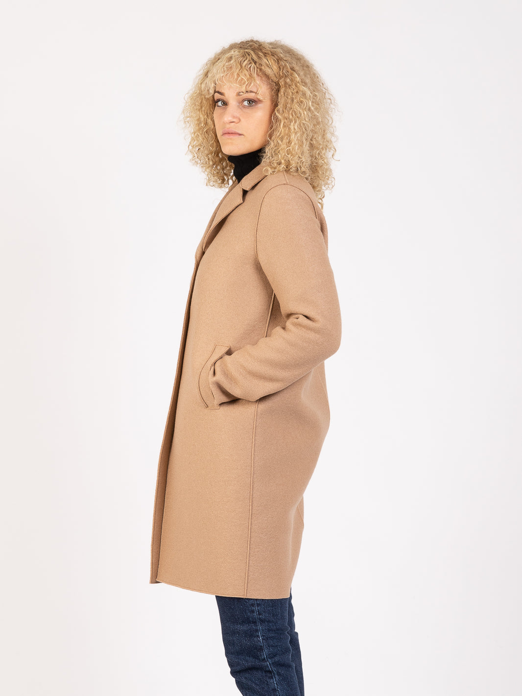 Tan button-up boxy pressed wool coat